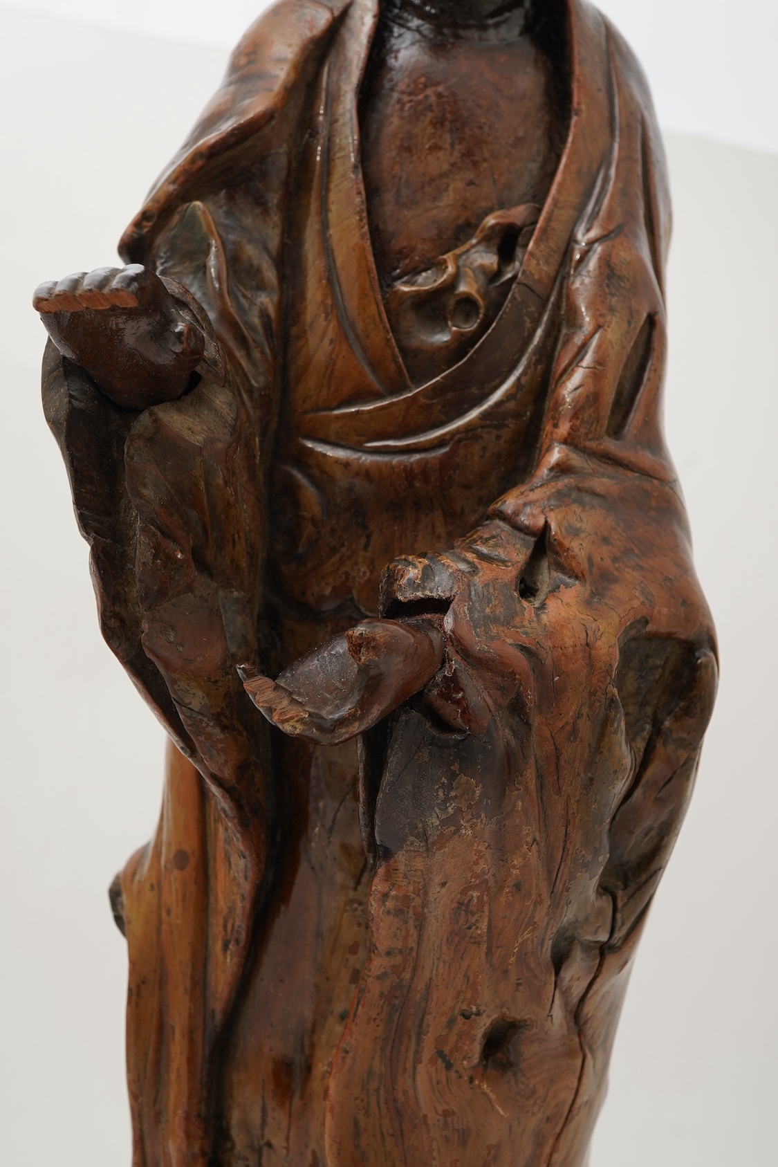 A Chinese rootwood standing figure of Guanyin, 18th/19th century